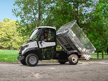 Vehicle with tipping cargo bed