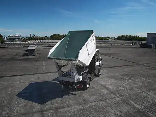 Tarp system for waste collection body Tarp system for waste collection body
